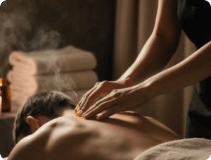 Client receiving aromatherapy back massage in a calming spa environment