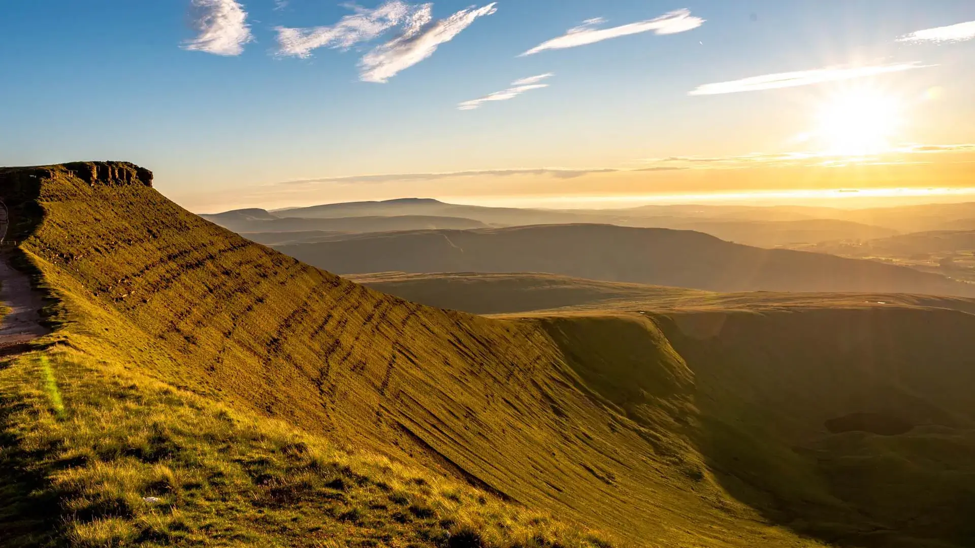 Bannau Brycheiniog mountains with rolling hills, green valleys, and scenic landscape in Wales