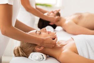 Couples enjoying relaxing spa treatment during a romantic spa break in Anglesey