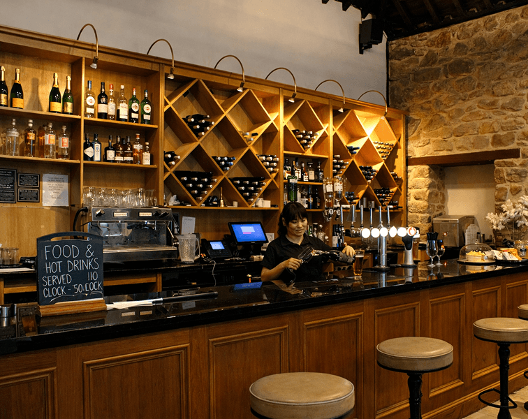 Guests relaxing in spa lounge area at Tre-Ysgawen Hall in Anglesey