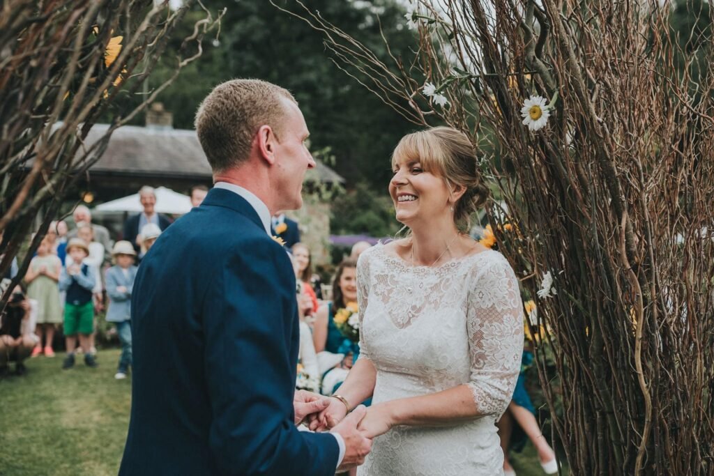 Rustic barn-style wedding setup in Anglesey with elegant décor and countryside surroundings