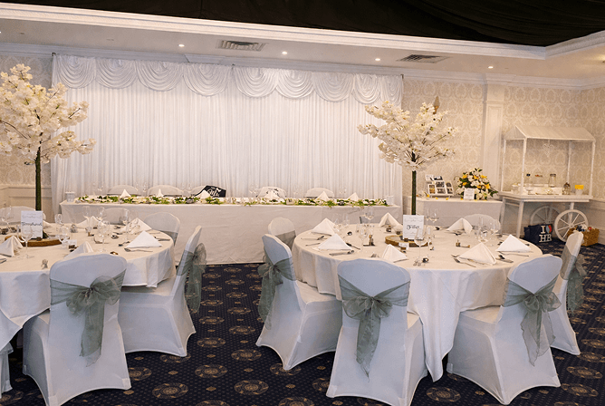 Anglesey Suite set for a wedding reception at Tre-Ysgawen Hall in Anglesey